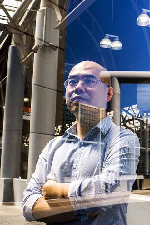 CEE professor in front of urban infrastructure