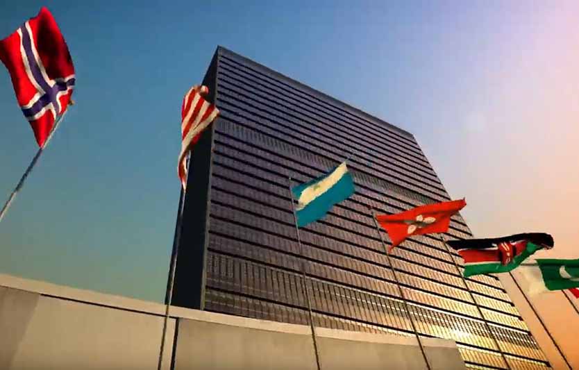 tall urban building with global flags.