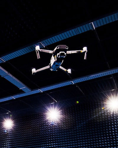 image of a drone and three lights