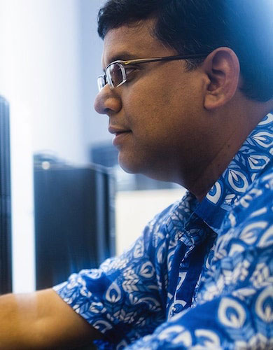 image of faculty at computer