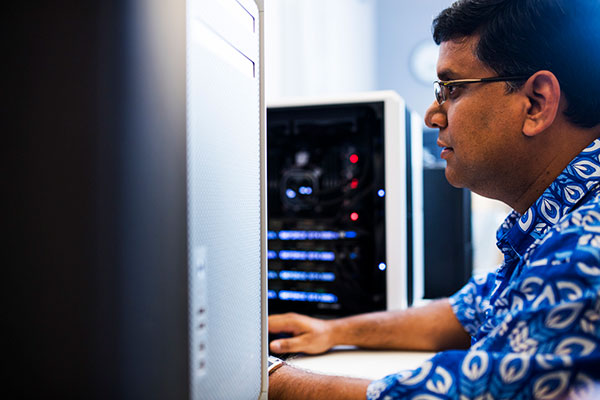 Ganguly working at a computer